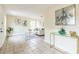 Bright living room with tile floors, neutral walls, and stylish decor at 1818 Kim Acres Ln, Dover, FL 33527