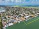 Stunning aerial view showcasing waterfront homes, private docks, and access to the Gulf of America at 191 1St W St, Tierra Verde, FL 33715