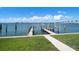 Dock with a boat lift and water views at 191 1St W St, Tierra Verde, FL 33715