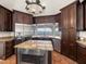 Updated kitchen with island, stainless steel appliances, granite counters, and views of the intercoastal at 191 1St W St, Tierra Verde, FL 33715