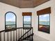 Charming tower room with arched windows offering scenic water views at 191 1St W St, Tierra Verde, FL 33715