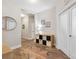 Spacious hallway with wood-look tile flooring and neutral paint at 19323 Hawk Valley Dr, Tampa, FL 33647