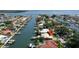 Beautiful waterfront property with boat docks, lush landscaping, and serene water views at 2017 Iowa Ne Ave, St Petersburg, FL 33703