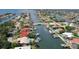 Aerial view of a waterfront home with a pool on a canal system offering boating and scenic views at 2017 Iowa Ne Ave, St Petersburg, FL 33703