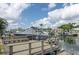 Private boat dock and boat lift offering direct access to the open water with stunning water views at 2017 Iowa Ne Ave, St Petersburg, FL 33703