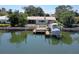 Waterfront home featuring a private boat lift and dock, perfect for boating enthusiasts with canal access at 2017 Iowa Ne Ave, St Petersburg, FL 33703