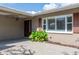 Home with brick accents, a paved entrance, and neat landscaping for a welcoming curb appeal at 2017 Iowa Ne Ave, St Petersburg, FL 33703