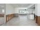 Bright, spacious kitchen, ready for remodel, with an island and open floor plan at 2017 Iowa Ne Ave, St Petersburg, FL 33703