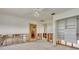 Living room featuring a built-in cabinet ready for renovation, and damaged walls at 2017 Iowa Ne Ave, St Petersburg, FL 33703