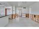 Open living space, awaiting remodel, with an open kitchen and lots of natural light at 2017 Iowa Ne Ave, St Petersburg, FL 33703