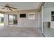 Covered patio with brick flooring leading to pool deck with views into the home at 2017 Iowa Ne Ave, St Petersburg, FL 33703