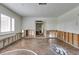Renovated home interior recreation room with half-court basketball court and natural light at 2017 Iowa Ne Ave, St Petersburg, FL 33703