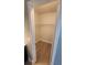 Walk-in closet with wood-look floors and wire shelving at 2205 Belleair Rd # A36, Clearwater, FL 33764