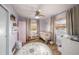 bedroom featuring wood floors and a ceiling fan at 2353 Dora Dr, Clearwater, FL 33765