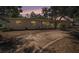The home's front exterior at dusk, showcasing a well-maintained yard and classic architecture at 2353 Dora Dr, Clearwater, FL 33765