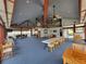 Spacious community room with vaulted ceilings, exposed beams, and ample seating at 2424 W Tampa Bay Blvd # M-201, Tampa, FL 33607