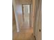 Hallway featuring tile flooring and neutral walls at 2424 W Tampa Bay Blvd # M-201, Tampa, FL 33607