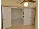 Living room featuring tile flooring, neutral walls, and an open floor plan at 2424 W Tampa Bay Blvd # M-201, Tampa, FL 33607