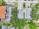 An aerial view shows the roof and parking areas of two modern townhomes with parking at 308 S New Jersey Ave # A, Tampa, FL 33609