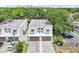 From above, view the townhomes and their location near lush greenery and trees at 308 S New Jersey Ave # A, Tampa, FL 33609