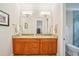 The bathroom includes granite countertops, tiled floors, and double sinks at 308 S New Jersey Ave # A, Tampa, FL 33609