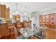 Dining area with pendant lighting and kitchen bar with seating, perfect for entertaining at 308 S New Jersey Ave # A, Tampa, FL 33609