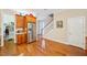 Bright kitchen has stainless steel refrigerator and access to stairs at 308 S New Jersey Ave # A, Tampa, FL 33609