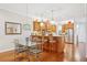 Well-equipped kitchen featuring stainless steel appliances, counter seating, and stylish pendant lights at 308 S New Jersey Ave # A, Tampa, FL 33609