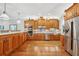 Modern kitchen featuring stainless steel appliances, custom cabinetry, and a large island at 308 S New Jersey Ave # A, Tampa, FL 33609