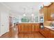 Bright and open floor plan with kitchen, dining area, and doors to the outdoor pool at 308 S New Jersey Ave # A, Tampa, FL 33609