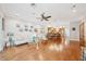 Bright living room featuring hardwood floors, modern furniture, and a ceiling fan at 308 S New Jersey Ave # A, Tampa, FL 33609