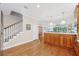 Open floor plan featuring a kitchen, stairway and access to the backyard pool at 308 S New Jersey Ave # A, Tampa, FL 33609