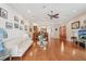 Open-plan living area with hardwood floors, stylish decor, and a comfortable white sofa at 308 S New Jersey Ave # A, Tampa, FL 33609