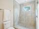 This beautifully designed shower features a glass enclosure and tiled walls at 308 S New Jersey Ave # A, Tampa, FL 33609