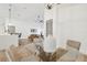 Dining room featuring a glass table and a view to the living room and kitchen at 3205 Pleasant Lake Dr, Tampa, FL 33618