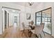 Dining room featuring a glass table with seating for four and view of the pool at 3205 Pleasant Lake Dr, Tampa, FL 33618