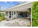 A carport with plenty of space for storage and outdoor equipment at 361 Colonial Ct, Dunedin, FL 34698