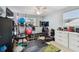 Dedicated home gym equipped with various fitness machines and ample workout space at 361 Colonial Ct, Dunedin, FL 34698