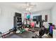 Dedicated home gym equipped with various fitness machines and ample workout space at 361 Colonial Ct, Dunedin, FL 34698