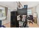 Functional room featuring a storage drawer and shelving unit with natural light, ideal for office work or hobbies at 361 Colonial Ct, Dunedin, FL 34698