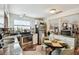 Well-lit kitchen with modern appliances and adjacent dining area at 361 Colonial Ct, Dunedin, FL 34698