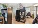 Featuring a functional office space with shelving units, a workstation, and natural light at 361 Colonial Ct, Dunedin, FL 34698