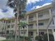 Well-maintained condo complex featuring multiple balconies and lush landscaping at 3850 13Th N Ave # 311, St Petersburg, FL 33713