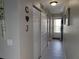 Hallway featuring closet space and easy access to the entrance with neutral paint color at 3850 13Th N Ave # 311, St Petersburg, FL 33713