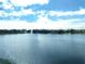 Lake view featuring a serene fountain and beautiful surroundings at 3850 13Th N Ave # 311, St Petersburg, FL 33713