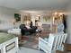 Spacious open-concept living and dining area with natural light at 3850 13Th N Ave # 311, St Petersburg, FL 33713