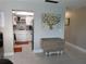 Inviting living room featuring an open layout with tiled floors and neutral color palette at 3850 13Th N Ave # 311, St Petersburg, FL 33713