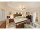 Cozy main bedroom featuring a queen bed, stylish furnishings, ample natural light, and neutral decor at 4326 Great Lakes N Dr, Clearwater, FL 33762
