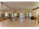 Spacious clubhouse interior with tile floors, seating areas, and large windows at 4968 Anniston Cir, Tampa, FL 33647