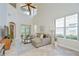 Bright living room with high ceilings and natural light at 4968 Anniston Cir, Tampa, FL 33647